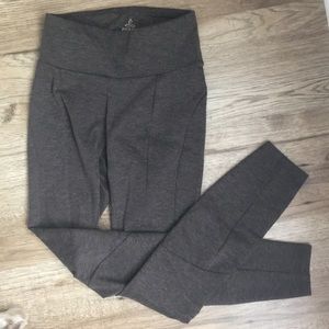 Dark brown Prana leggings with stitch detail.